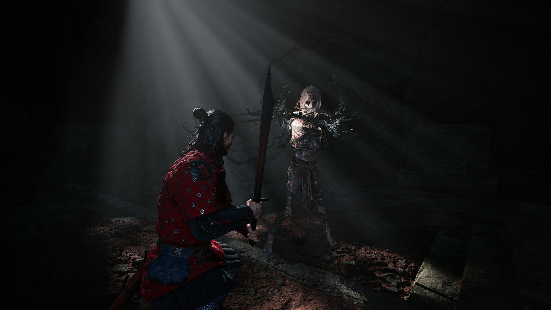 Coen facing a spectral figure with a long blade in a dark chamber